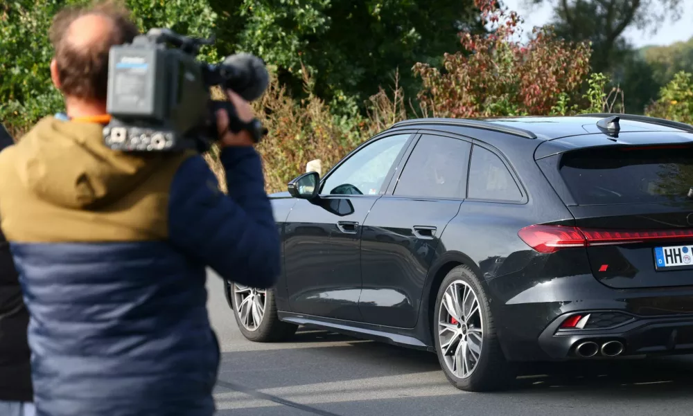 A car believed to be carrying Christian B., who was formally identified in 2020 as a suspect in the case of the disappearance of British toddler Madeleine McCann, and was serving a sentence for raping a 72-year-old American woman, leaves after his release from prison in Sehnde, Germany, September 17, 2025. REUTERS/Leon Kuegeler