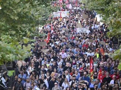 FILE- Protesters march during a rally of the "Block Everything" movement in Marseille, south of France, Wednesday, Sept. 10, 2025. (AP Photo/Philippe Magoni, File)