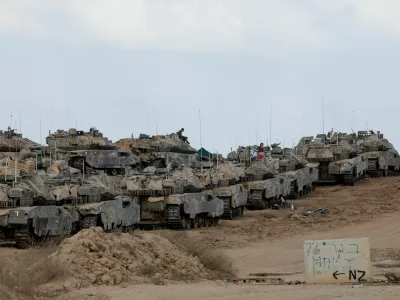Israeli tanks stand near the Israel-Gaza border, as seen from Israel, September 19, 2025. REUTERS/Ammar Awad