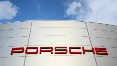 FILE PHOTO: A logo of Porsche is seen outside a Porsche car dealer in Brussels, Belgium March 13, 2023. REUTERS/Yves Herman/File Photo/File Photo
