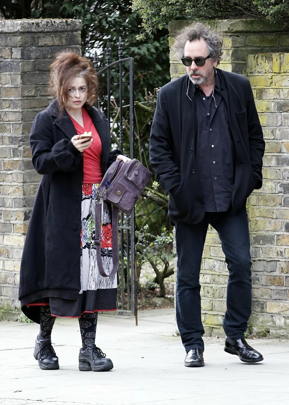 EXCLUSIVE TO INF.April 27 2013: Helena Bonham Carter and Tim Burton spotted in a new multi colored mini in North London, UK. Helen used her bunny ears mobile phone to try pay for parking which she had trouble with so used cash instead.,Image: 160552015, License: Rights-managed, Restrictions: EXCLUSIVE TO INF., Model Release: no