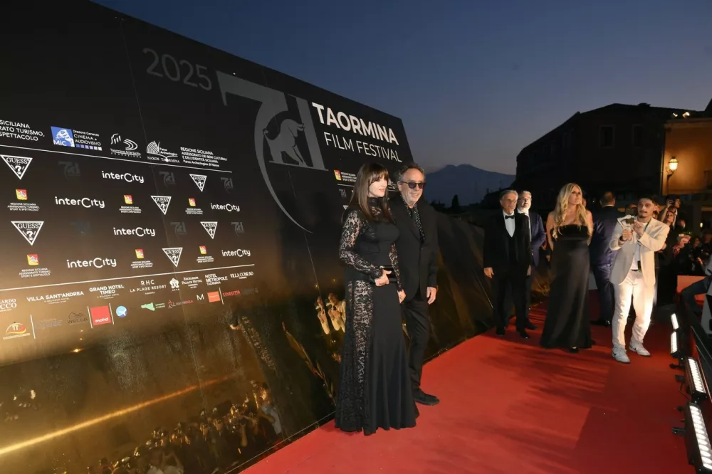 Taormina, Italy: Taormina: Hotel Metropole: 71&Acirc;&deg; Taormina Film Festival, Closing Cocktail. In the photo: Monica Bellucci, Tim Burton,Image: 1011308358, License: Rights-managed, Restrictions: * Italy Rights OUT *, Model Release: no