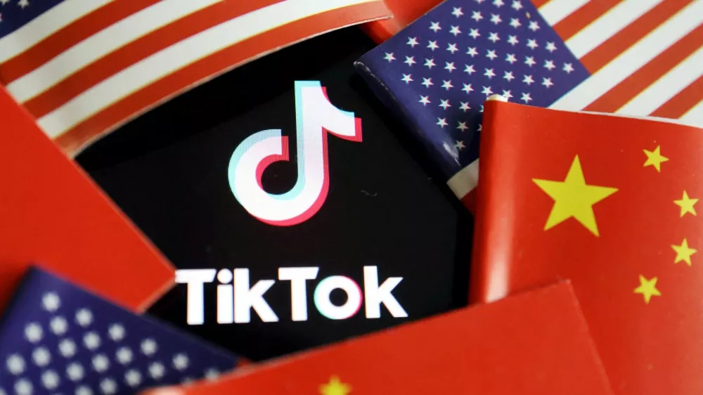 FILE PHOTO: China and U.S. flags are seen near a TikTok logo in this illustration picture taken July 16, 2020. REUTERS/Florence Lo/Illustration/File Photo
