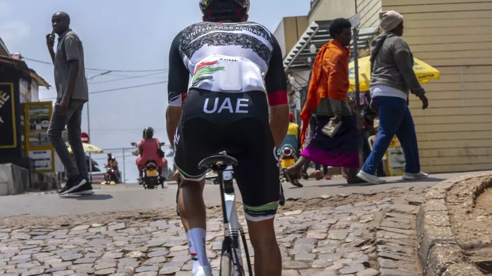 Members of the National UAE team practice on the Wall of Kigali, Rwanda, Friday, Sept. 19, 2025, in anticipation of the upcoming UCI road cycling world championships. (AP Photo/Jerome Delay)