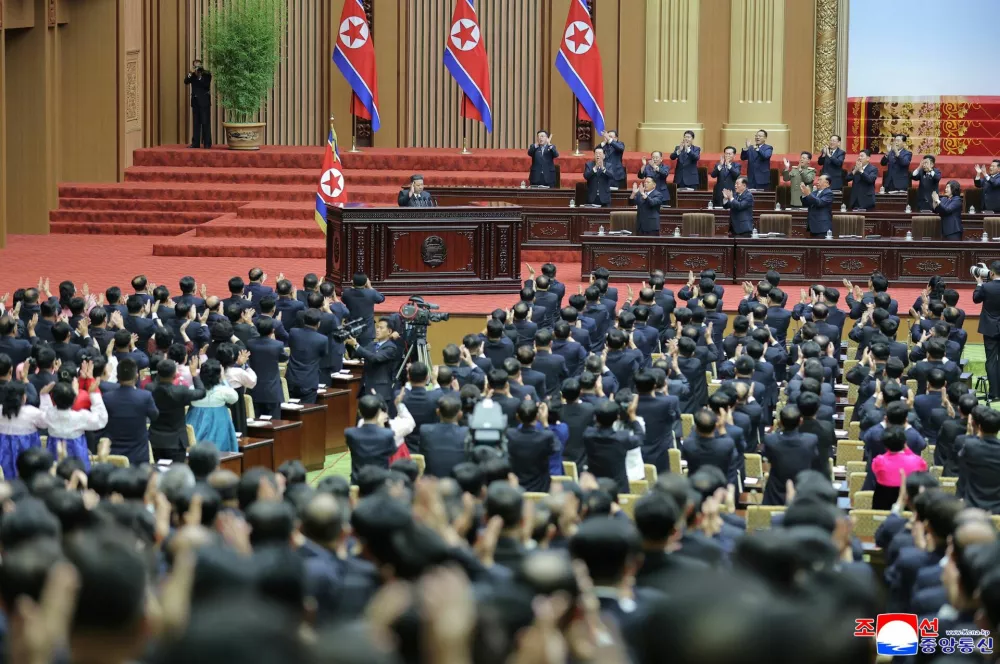 Officials and attendees applaud as North Korean leader Kim Jong Un speaks during a meeting of the Supreme People's Assembly at the Mansudae Assembly Hall in Pyongyang, North Korea, in this picture released September 22, 2025 by North Korea's official Korean Central News Agency.  KCNA via REUTERS  ATTENTION EDITORS - THIS IMAGE WAS PROVIDED BY A THIRD PARTY. REUTERS IS UNABLE TO INDEPENDENTLY VERIFY THIS IMAGE. NO THIRD PARTY SALES. SOUTH KOREA OUT. NO COMMERCIAL OR EDITORIAL SALES IN SOUTH KOREA.   TPX IMAGES OF THE DAY
