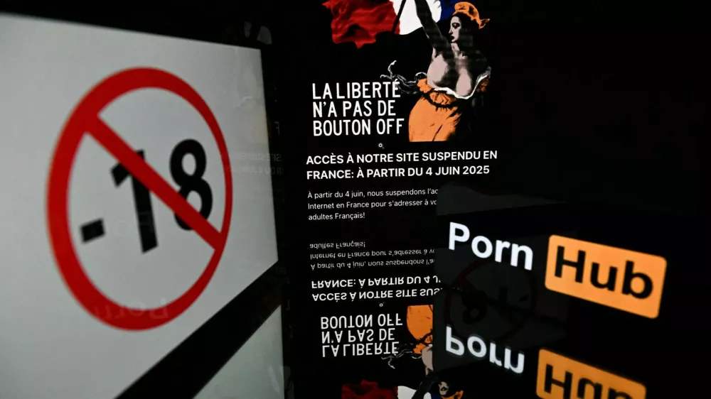 This illustration photo taken on June 4, 2025, in Toulouse, southern France, shows a banned to under 18 symbol, a Pornhub logo, and a display upon connection to the Pronhub pornographic website, with the image of the allegorical figure of Liberty "Marianne" from Eugene Delacroix's 1830 painting "Liberty Leading the People" along with an explanatory text, as the operator blocked the site's access in protest over requirements to check the age of users. French visitors to major adult websites Pornhub, YouPorn and RedTube were met on June 4 with a message denouncing privacy risks from government demands that they verify users' ages. France has this year gradually introduced requirements for all adult websites to have users confirm their age with details like a credit card or ID document, aiming to prevent minors from accessing pornography.,Image: 1007212812, License: Rights-managed, Restrictions:, Model Release: no