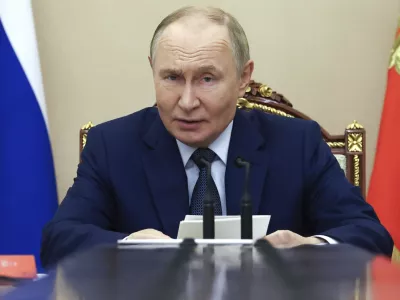 Russian President Vladimir Putin chairs a Security Council meeting at the Kremlin in Moscow, Russia, Monday, Sept. 22, 2025. (Alexander Kazakov, Sputnik, Kremlin Pool Photo via AP)