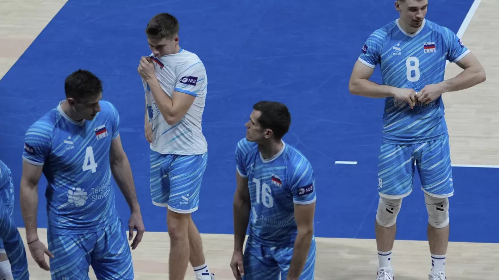 Slovenia players react after losing to the United States during their round of 16 match at the 2025 FIVB Volleyball Men's World Championship at the Mall of Asia Arena, Pasay city, Philippines on Monday Sept. 22, 2025. (AP Photo/Aaron Favila)