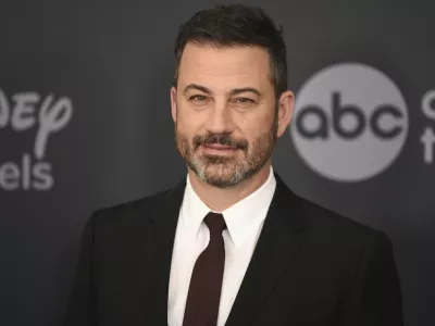 FILE - Jimmy Kimmel appears at the Walt Disney Television upfront in New York on May 14, 2019. (Photo by Evan Agostini/Invision/AP, File)