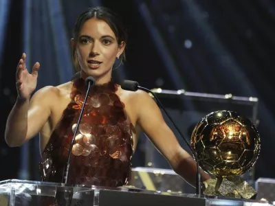 Barcelona's Aitana Bonmatí receives the 2025 Women's Ballon d'Or during the 69th Ballon d'Or awards ceremony at the Theatre du Chatelet in Paris, Monday, Sept. 22, 2025. (AP Photo/Thibault Camus)