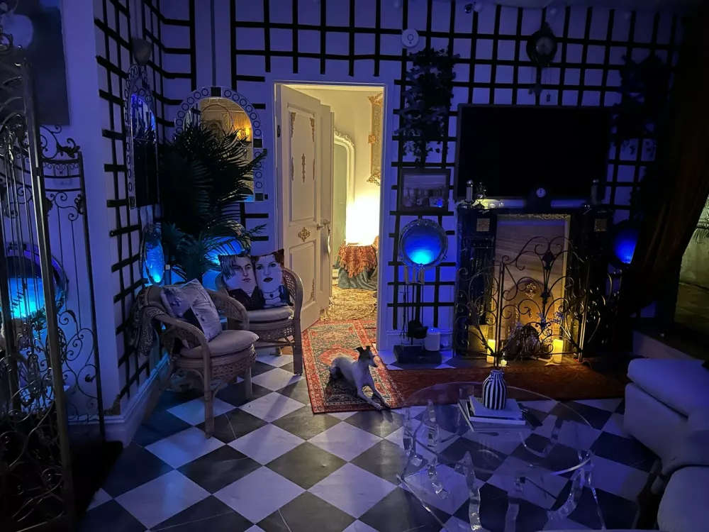 Story from Jam Press (Titanic Decorated Apartment)Pictured: Inside the Titanic home.Woman who has seen Titanic hundreds of times turns FLAT into ship replica with iceberg – and invites HINGE date overA woman has turned her flat into the TITANIC complete with a grand staircase and an iceberg – and she even invited her Hinge date round for a tour.Superfan Sarah Boll has spent months transforming her two-bed rental into a full-blown tribute to the doomed liner – and she's gone full steam ahead.The 27-year-old says what started as an idea for a small themed party quickly spiralled into an obsession.Now her walls, ceilings and even her bedroom have been revamped to recreate the ship's most famous rooms.From portholes to a "sinking room" and replica artefacts, every room has been styled to make you feel like you're stepping back into 1912."I've been a huge Titanic fanatic, to say the least, since I was 11," the model and a real estate agent told What's The Jam."For my high school graduation, my dad gave me a model ship of the Titanic, and my mom shipped it to me when I had space for it."I was going to have a small Titanic party, but once I started decorating, it was difficult to stop – especially after I started posting videos on TikTok.'Also, I just love interior design and anything to do with shades of blue and water."Sarah started decorating her New York City apartment in March 2025.Step inside and you're greeted by her version of the Grand Staircase, built with stick-on tiles, plastic ceiling panels and even a salad bowl turned into the glass dome.There are velvet ribbon walls, gold trim, faux greenery and mirrors dressed up as café windows.Sarah says her friends and family have been stunned by the transformation – but none more so than her Hinge date, who got the full Titanic tour when he came over to visit.She said: "He was totally on board. I told him about my apartment before he came over and asked if he would be okay if I filmed his reaction. He was so chill about it."The reactions from everyone else have been hilarious. Some people like it and others think it's insane."It's been 50/50 – there's been a lot of, 'I can't decide if she's cool or needs to be institutionalised'"Sarah says the real showstopper is her "sinking room", where visitors can first see Titanic sailing on a starry night before it hits the iceberg.Walking into the room, a model ship dangles from the ceiling mid-sink while a dresser painted to look like the liner appears to go down beneath the waves.The floor shimmers with mirrored silver paper like water, fabric drapes create the feel of being underwater and mini replicas show the wreck on the seabed.Sarah has even filled drawers with sand and crockery to echo what divers found.The bathroom continues the theme, covered in mirrored paper and newspaper clippings, with all 1,500 victims' names written out and stuck on the walls.Meanwhile, her bedroom has been styled as a first-class suite, complete with a gold comforter and a porthole by the bed.Sarah admits the whole thing came together impulsively – with no real plan – and she hasn't even kept track of how much it cost.She's since built a following of 18,000 online by sharing TikTok tours of her ship-shaped flat, with viewers torn between calling her a genius or saying she's lost the plot.And while Sarah says she may eventually change her apartment theme, for now she's staying firmly on board the Titanic – enjoying what she calls the best summer of her life.She said: "I'll switch up the theme eventually; I'm planning on an Alice in Wonderland theme."I'm not sure when I'll do that though. I want my parents to see Titanic first."I love my apartment – I've never had a better summer in my life."ENDSEDITOR'S NOTE: Video Usage Licence: (EXCLUSIVE) We have obtained an exclusive licence from the copyright holder. A copy of the licence is available on request.Video Restrictions: None.,Image: 1035233146, License: Rights-managed, Restrictions: EDITOR'S NOTE: Video Usage Licence: (EXCLUSIVE) We have obtained an exclusive licence from the copyright holder. A copy of the licence is available on request.Video Restrictions: None., Model Release: no