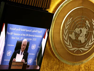 Palestinian President Mahmoud Abbas addresses the 80th United Nations General Assembly via video, at U.N. headquarters in New York, U.S., September 25, 2025. REUTERS/Caitlin Ochs   TPX IMAGES OF THE DAY