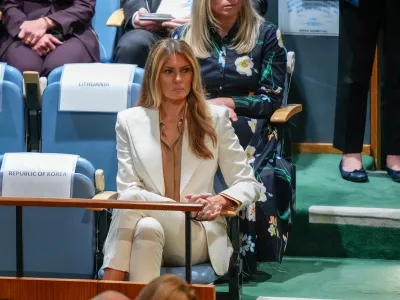 First Lady Melania Trump listens as President Donald Trump speaks during the 80th session of the United Nations General Assembly, Tuesday, Sept. 23, 2025, at U.N. headquarters. (AP Photo/Yuki Iwamura)