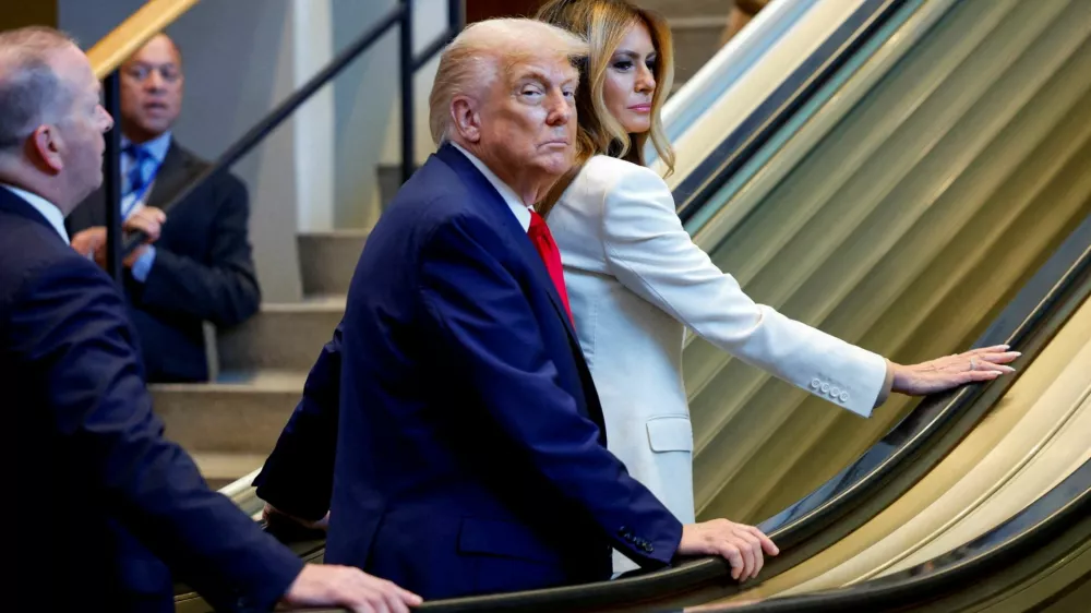 U.S. President Donald Trump and first lady Melania Trump ride an escalator as they arrive to attend the 80th United Nations General Assembly, in New York City, New York, U.S., September 23, 2025. REUTERS/Kylie Cooper TPX IMAGES OF THE DAY