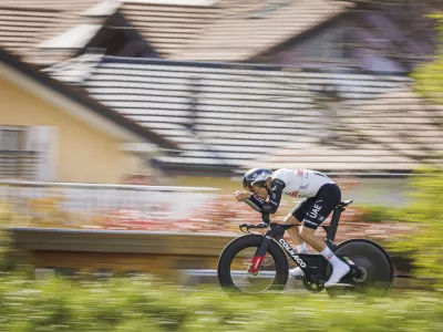 Juan Ayuso from Spain in action during the prologue, a 6,82 km race against the clock, at the 76th Tour de Romandie UCI World Tour Cycling race, in Le Bouveret, Switzerland, Tuesday, April 25, 2023. (Valentin Flauraud/Keystone via AP)