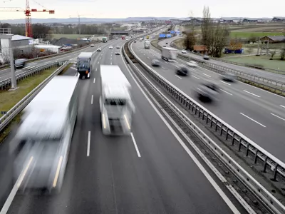 ﻿10 December 2021, Baden-Wuerttemberg, Stuttgart: Trucks and cars drive over the Autobahn 8 near Lenfelden-Echterdingen (wiping effect due to long exposure). Photo by: Bernd Wei'brod/picture-alliance/dpa/AP Images