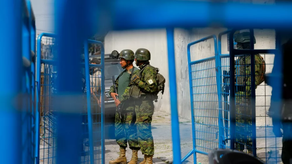 Military personnel guard the entrance to El Inca prison after a security operation due to riots, following the disappearance of Jose Adolfo Macias, alias 'Fito', leader of the Los Choneros criminal group, in Quito, Ecuador January 8, 2024. REUTERS/Karen Toro 
