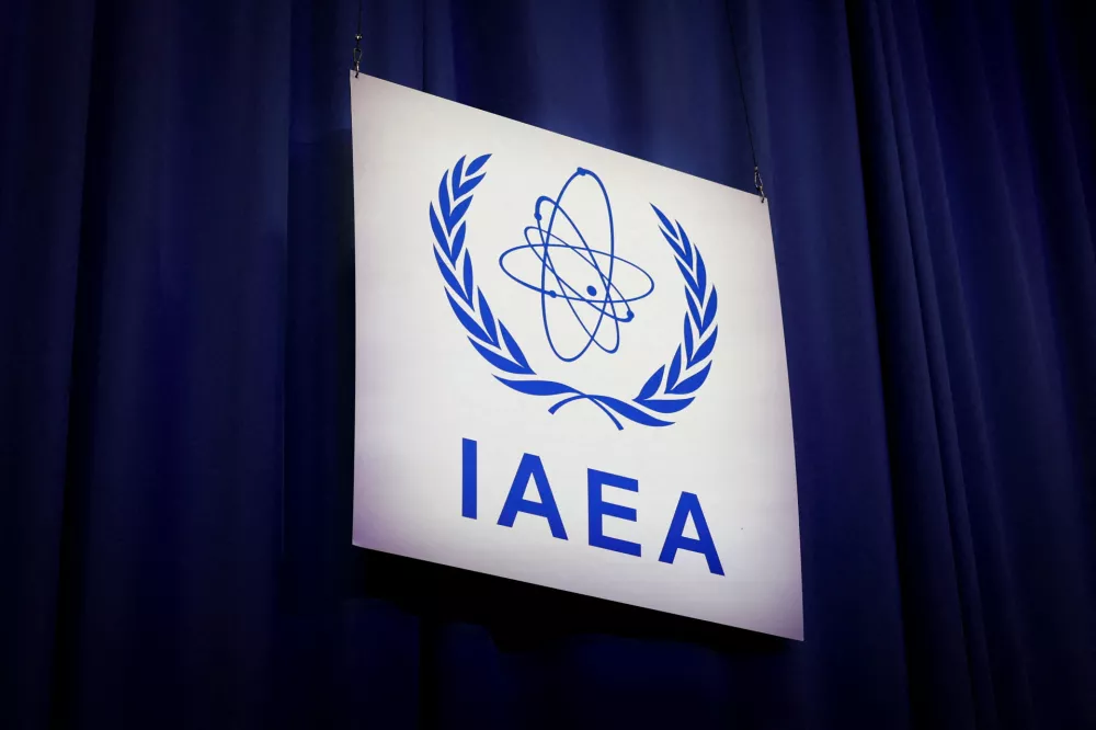 FILE PHOTO: An International Atomic Energy Agency (IAEA) sign at the opening of the IAEA General Conference at the agency's headquarters in Vienna, Austria, September 15, 2025. REUTERS/Lisa Leutner/File Photo
