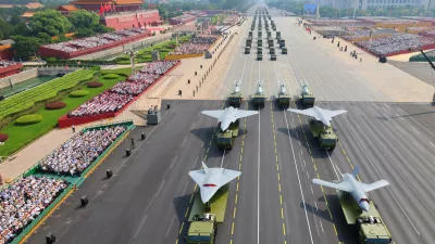 FILE - In this photo provided by China's Xinhua News Agency,In this photo released by Xinhua News Agency, drones and other armament formations pass during the military parade to commemorate the 80th anniversary of the end of World War II held in front of Tiananmen Gate in Beijing, Wednesday, Sept. 3, 2025. (Liu Xu/Xinhua via AP, File)