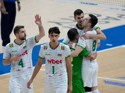 Bulgarian players encourage each other during their semifinal match against the Czech Republic at the 2025 FIVB Volleyball Men's World Championship in Pasay city, Philippines, Saturday, Sept. 27, 2025. (AP Photo/Aaron Favila)
