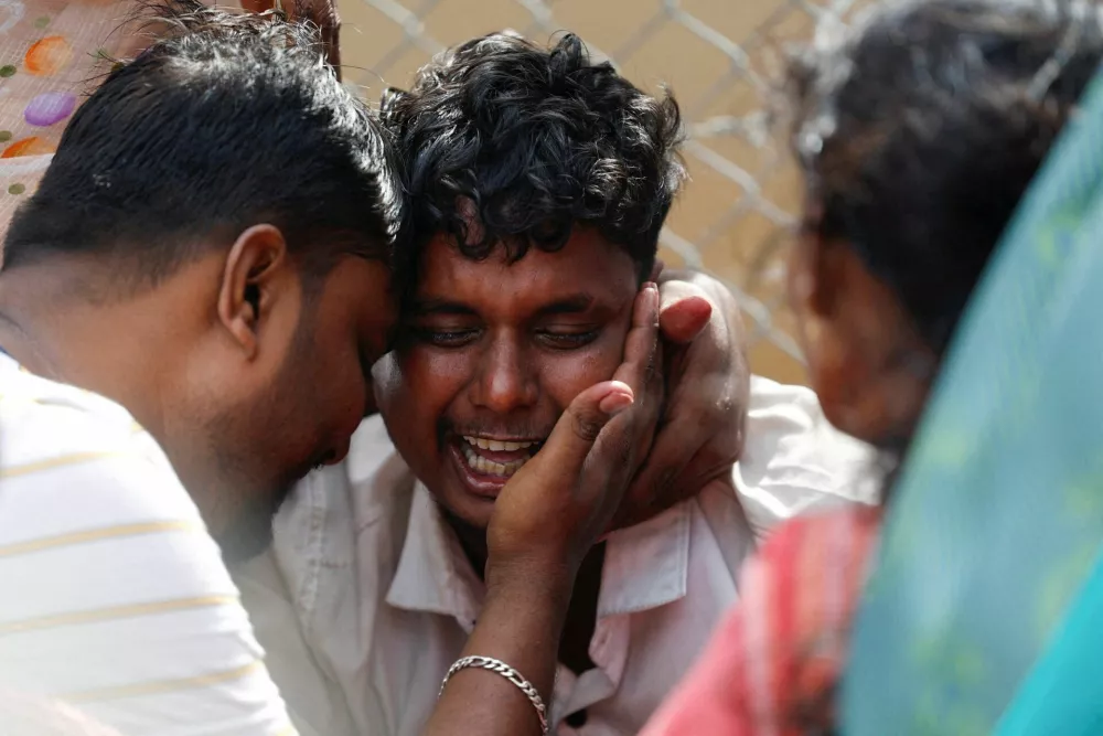 Santosh, who lost his seven-year-old child in a stampede at a election campaign rally held by Tamilaga Vettri Kazhagam party, bursts into tears in front of Karur Government Medical College as he arrives to receive the body, in Karur district of Tamil Nadu, India, September 28, 2025. REUTERS/Priyanshu Singh   TPX IMAGES OF THE DAY