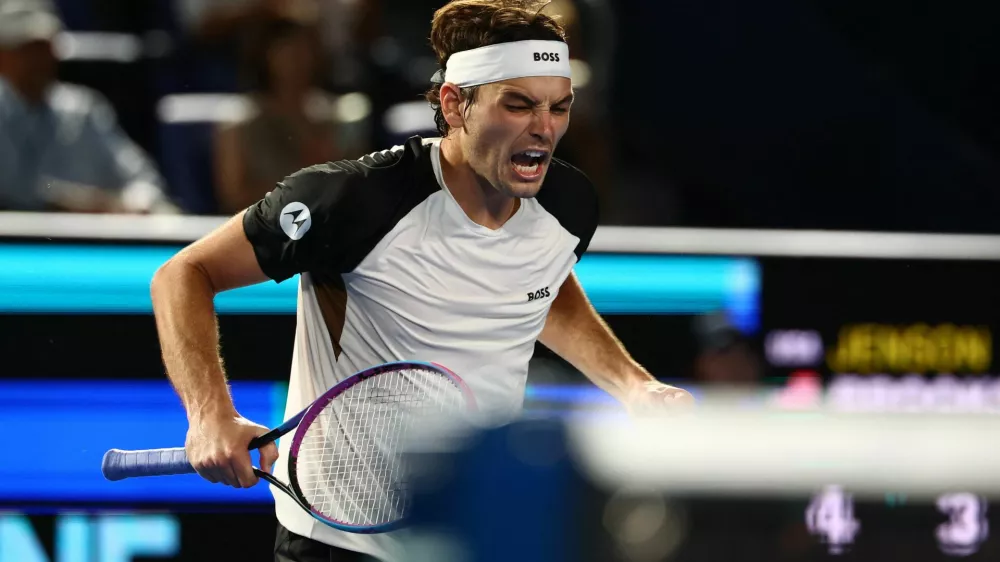 Tennis - ATP 500 - Japan Open Tennis Championships - Ariake Coliseum, Tokyo, Japan - September 29, 2025 Taylor Fritz of the U.S. celebrates winning his semi final match against Jenson Brooksby of the U.S. REUTERS/Issei Kato