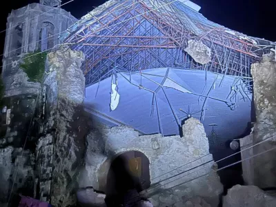 Damage outside the Archdiocesan Shrine of Santa Rosa de Lima in Cebu City is shown on Tuesday, Sept. 30, 2025, after strong offshore earthquake with a preliminary magnitude of 6.9 shook the central Philippines. (Vince Sylvan A. Toring via AP)