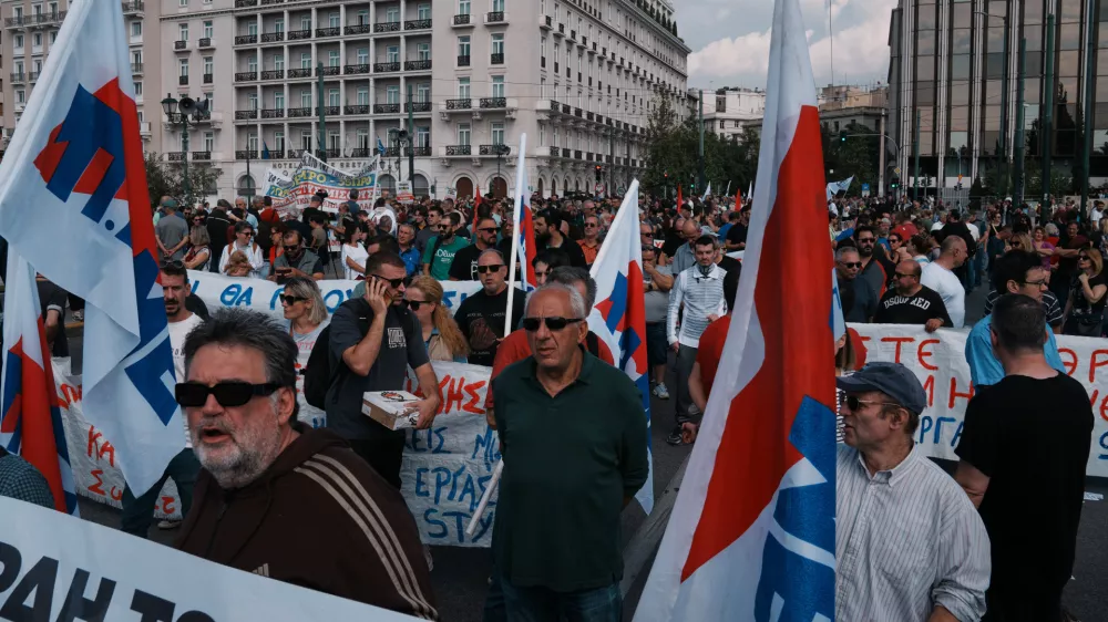 Protesters take part in a nationwide 24-hour strike in Athens, Greece, Wednesday, Oct. 1, 2025, as labor unions demand higher wages and the withdrawal of a bill changing work hours. (AP Photo/Thanassis Stavrakis)