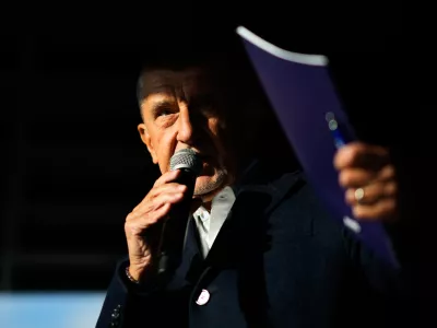 Chairman of opposition "ANO" (YES) movement Andrej Babis talks to his supporters during a rally ahead of Parliamentary elections in Prague, Czech Republic, Sept. 30, 2025. (AP Photo/Petr David Josek)