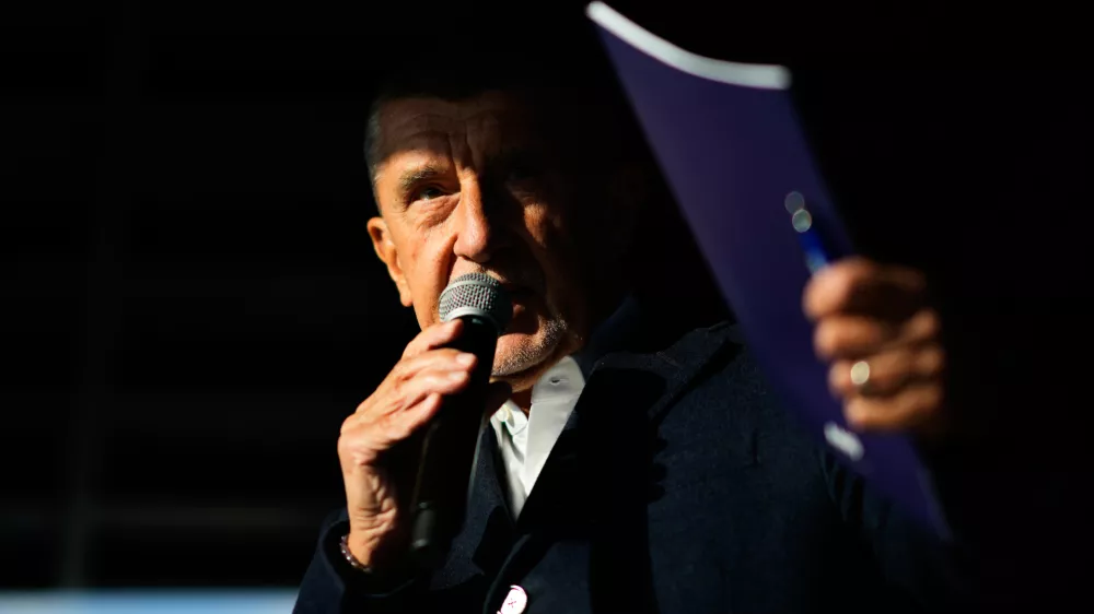 Chairman of opposition "ANO" (YES) movement Andrej Babis talks to his supporters during a rally ahead of Parliamentary elections in Prague, Czech Republic, Sept. 30, 2025. (AP Photo/Petr David Josek)