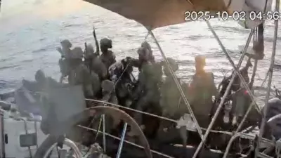 A screengrab from a live stream video shows Israeli navy forces surround the Gaza-bound vessel All In, part of the Global Sumud Flotilla, which flotilla organisers report has been intercepted, October 2, 2025. Global Sumud Flotilla/Handout via REUTERS THIS IMAGE HAS BEEN SUPPLIED BY A THIRD PARTY. MANDATORY CREDIT. NO RESALES. NO ARCHIVES.