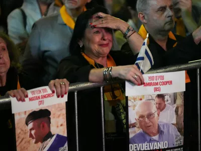 People gather in a park to demand Hamas release hostages who remain in captivity in Gaza, in Buenos Aires, Argentina, Tuesday, Sept. 30, 2025. (AP Photo/Rodrigo Abd)