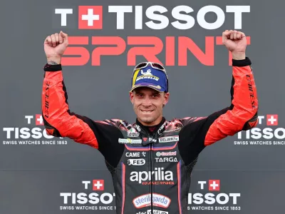 MotoGP - Indonesian Grand Prix - Mandalika International Street Circuit, Mandalika, Indonesia - October 4, 2025 Aprilia Racing's Marco Bezzecchi celebrates after winning the sprint race REUTERS/Willy Kurniawan