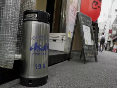 An empty keg of Asahi Super Dry stands outside the restaurant Kushiyaki Tosaka in Tokyo, Japan, October 3, 2025. REUTERS/Joseph Campbell