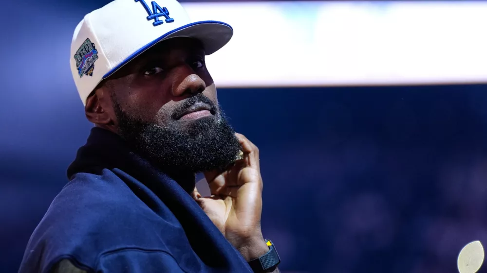 Los Angeles Lakers' Lebron James stands on the court before an NBA basketball preseason game against the Golden State Warriors, Sunday, Oct. 5, 2025, in San Francisco. (AP Photo/Godofredo A. Vásquez)