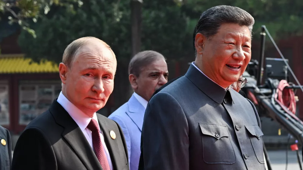 03 September 2025, China, Beijing: Russian President Vladimir Putin (L) and Chinese President Xi Jinping arrive for China's Victory Day military parade marking the 80th anniversary of victory over the militarist Japan and the end of World War II. Photo: Sergei Bobylev/TASS via ZUMA Press/dpa