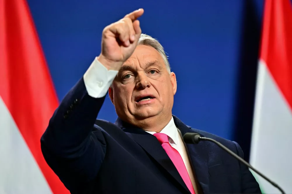 Hungarian Prime Minister Viktor Orban gestures as he holds an annual international media briefing in Budapest, Hungary, December 21, 2023. REUTERS/Marton Monus