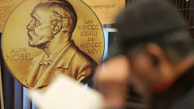 FILE - A visitor reads a book written by South Korean author Han Kang, this year's winner of the Nobel Prize in Literature, at a special section of a bookstore in Seoul, South Korea, Tuesday, Dec. 10, 2024. (AP Photo/Lee Jin-man, File)