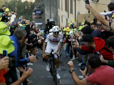 Reigning World Champion Tadej Pogacar pedals on his way to win Il Lombardia, Tour of Lombardy cycling race, in Bergamo, Italy, Saturday, Oct. 11, 2025. (Luca Bettini, LaPresse Pool via AP)