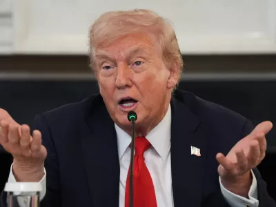 President Donald Trump speaks during a roundtable meeting on antifa in the State Dining Room at the White House, Wednesday, Oct. 8, 2025, in Washington. (AP Photo/Evan Vucci)