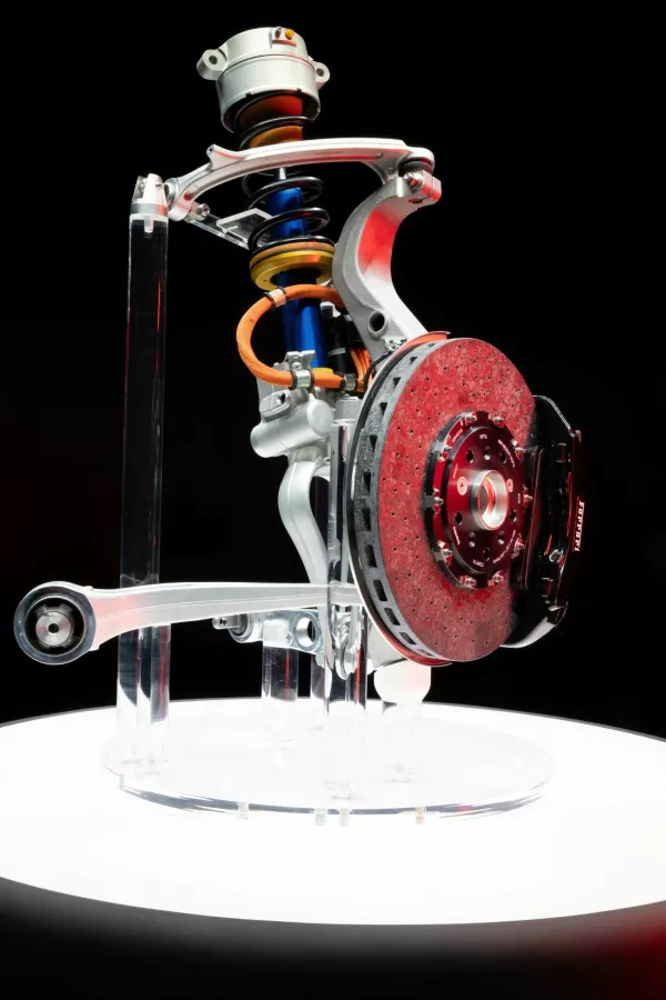 A view of the suspension and brake system as the new electric technology developed for Ferrari's first electric car, including chassis, battery modules and electric motor, is unveiled at the company's headquarters in Maranello, Italy, in this handout image released on October 8, 2025. Ferrari/Handout via REUTERS THIS IMAGE HAS BEEN SUPPLIED BY A THIRD PARTY. NO RESALES. NO ARCHIVES.