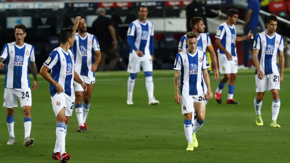 Espanyol's players during the Spanish La Liga soccer match between FC Barcelona and RCD Espanyol at the Camp Nou stadium in Barcelona, Spain, Wednesday, July 8, 2020. (AP Photo/Joan Monfort)