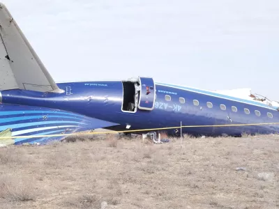 In this photo taken from a video released by the administration of Mangystau region, the wreckage of Azerbaijan Airlines Embraer 190 lies on the ground near the airport of Aktau, Kazakhstan, Wednesday, Dec. 25, 2024. (The Administration of Mangystau Region via AP)