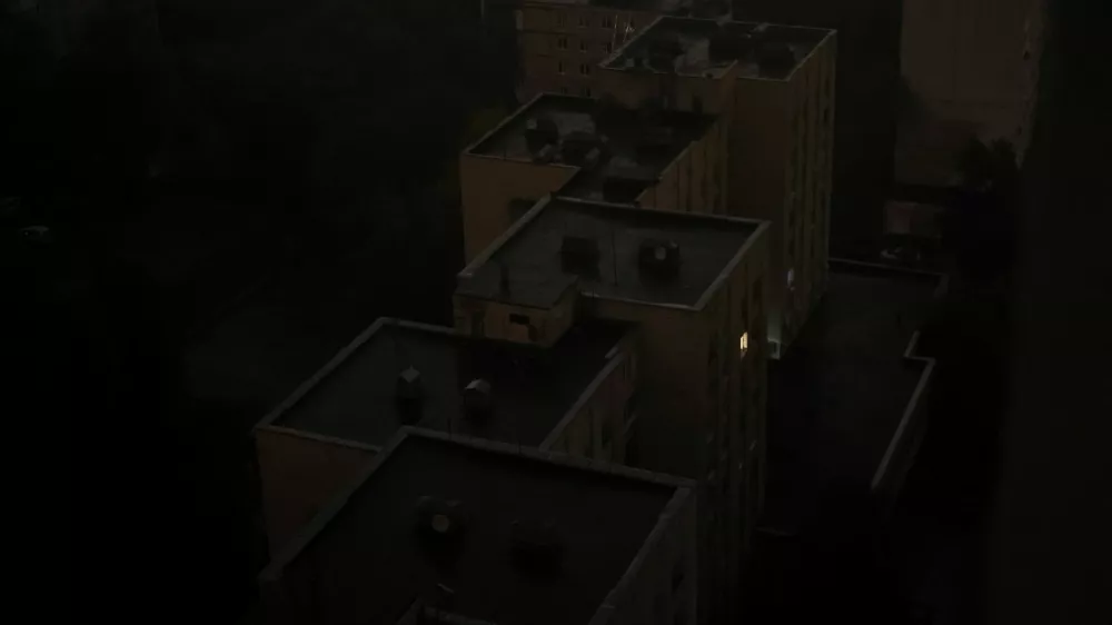 Residential buildings during a power blackout after critical civil infrastructure was hit by a Russian missile and drone attacks, amid Russia's attack on Ukraine, in Kyiv, Ukraine October 10, 2025. REUTERS/Gleb Garanich