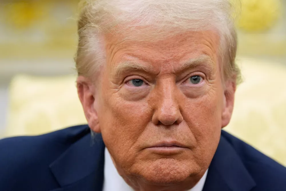 President Donald Trump listens during a meeting with Finland's President Alexander Stubb in the Oval Office at the White House, Thursday, Oct. 9, 2025, in Washington. (AP Photo/Alex Brandon)