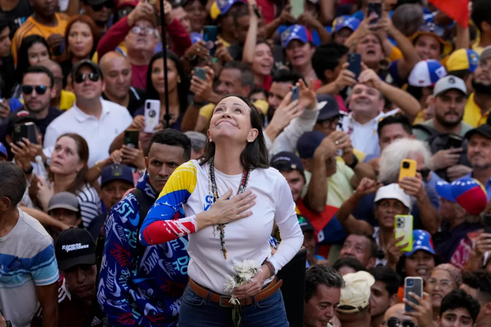 FILE - Venezuelan opposition leader Maria Corina Machado addresses supporters at a protest against President Nicolas Maduro in Caracas, Venezuela, Jan. 9, 2025, the day before his inauguration for a third term. (AP Photo/Ariana Cubillos, File)