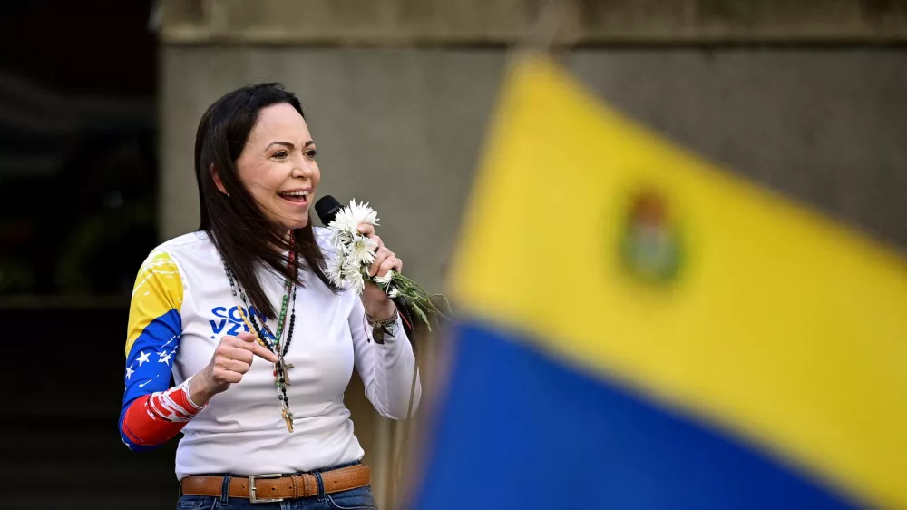 FILE PHOTO: Venezuelan opposition leader Maria Corina Machado addresses supporters at a protest before the inauguration of President Nicolas Maduro for his third term, in Caracas, Venezuela January 9, 2025. REUTERS/Gaby Oraa/File Photo