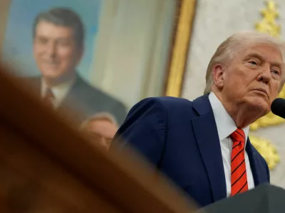 U.S. President Donald Trump looks on during an announcement about lowering U.S. drug prices, at the White House in Washington, D.C., U.S., October 10, 2025. REUTERS/Kent Nishimura