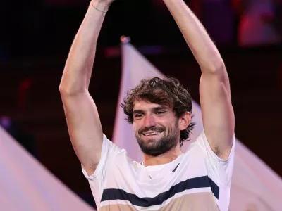Tennis - ATP Masters 1000 - Shanghai Masters - Qizhong Forest Sports City Arena, Shanghai, China - October 12, 2025 Monaco's Valentin Vacherot celebrates with the trophy after winning the final against France's Arthur Rinderknech REUTERS/Go Nakamura