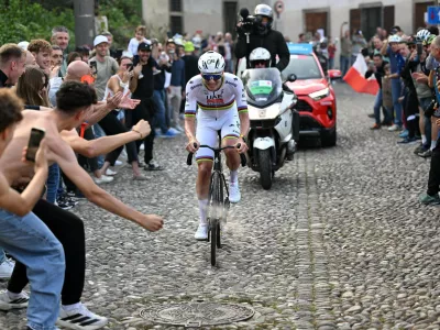 Reigning World Champion Tadej Pogacar pedals on his way to win Il Lombardia, Tour of Lombardy cycling race, in Bergamo, Italy, Saturday, Oct. 11, 2025. (Luca Bettini, LaPresse Pool via AP)
